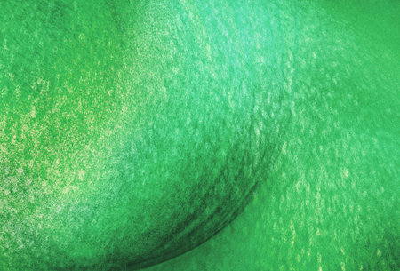 abstract green background with some smooth lines in it and some spots on itの写真素材
