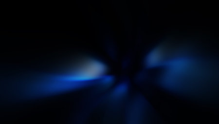 abstract black background with blue light and some smooth lines in itの写真素材