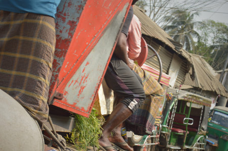Unidentified people on the street in Kolkata, West Bengal, India. Kolkata is the capital and largest...