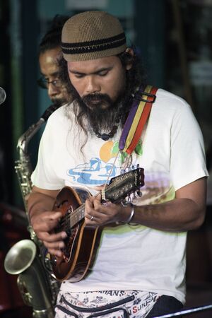 Man playing a guitar