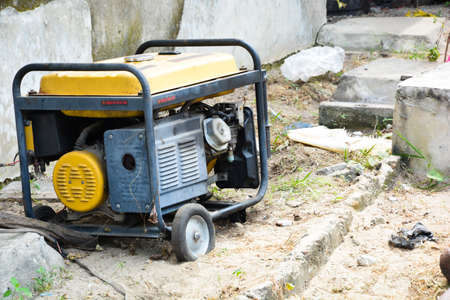Old, rusty fuel powered, abandoned Electric generatorの写真素材