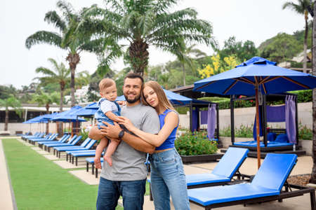 Family outdoors. family of three having fun and playing outdoors. happy family conceptの写真素材