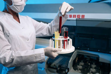 Woman scientist chemist working in modern laboratory