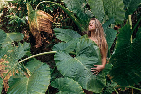 Lovely Caucasian girl enjoying a vacation in the tropicsの写真素材