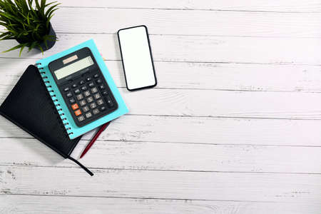 Top view: stationery on a white deskの写真素材