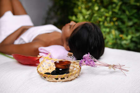Mixed race girl on spa treatments in luxury salonの写真素材