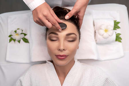 Beautiful caucasian Woman Getting Spa Treatment. Massage