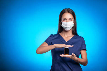 Beautiful Medical worker.e in a blue surgical suitの写真素材