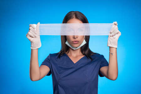 Beautiful Medical worker.e in a blue surgical suitの写真素材