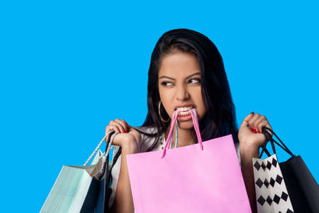 Big sale concept. Beautiful girl and shopping