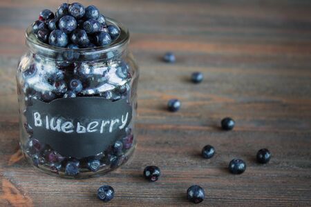 Blueberry antioxidant organic superfood in a jar concept for healthy eating and nutritionの写真素材