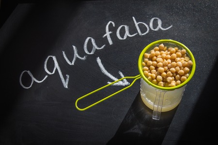 Chickpea liquid water brine draining. Vegan Aquafabaの写真素材