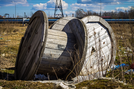 An empty cable reel is left on site. The problem of ecologyの写真素材