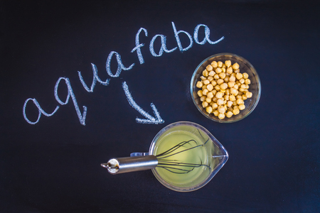 Chickpea liquid water brine draining. Vegan Aquafaba.の写真素材