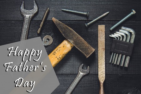 Joinery tools on a dark wooden table. Place for the text. A concept for Father's Day. Top view. Flat laying.の写真素材