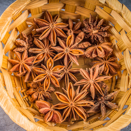 star anise and cinnamon on the gray background.の写真素材