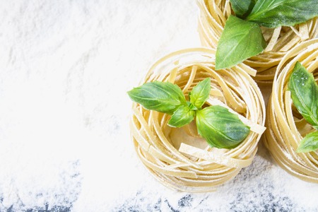 Tasty Fresh Colorful Ingredients for Cooking Pasta Tagliatelle.の写真素材
