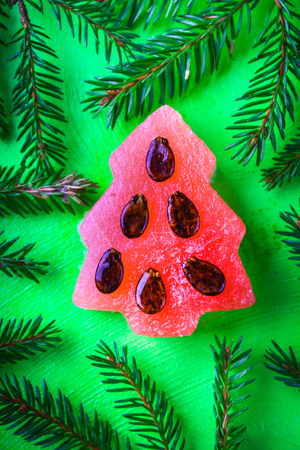 New Year tree made of watermelon with seeds. New Year Christmas.の写真素材