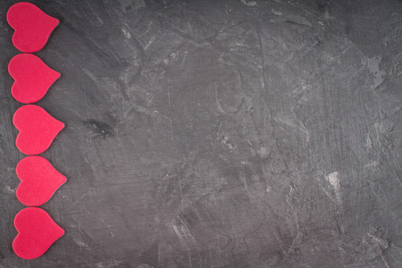 Pink hearts on a gray background. The symbol of the day of lovers. Valentine's Day. Concept February 14の写真素材