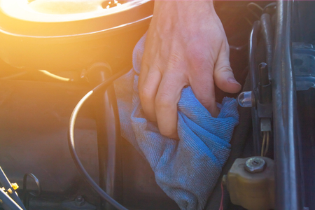 Close up of dirt on detail of old car engine at the garageの写真素材