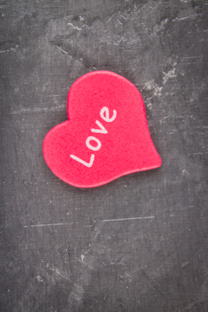 Pink hearts on a gray background. The symbol of the day of lovers. Valentine's Day. Concept February 14の写真素材
