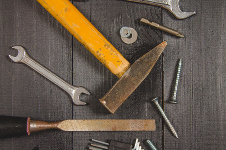 Joinery tools on a dark wooden table. Place for the text. A concept for Father's Day. Top view. Flat laying.の写真素材