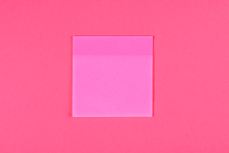 Sheets for notes on a pink pastel background. Summer. Top view. Flat lay. Copy spaceの写真素材