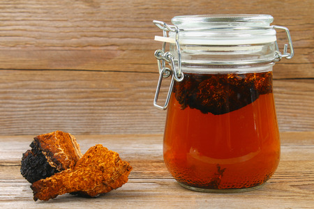 Healing tea from birch mushroom chaga is used in folk medicineの写真素材