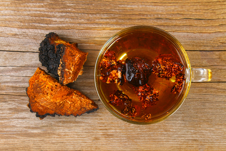Healing tea from birch mushroom chaga is used in folk medicineの写真素材