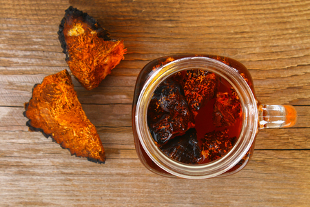 Healing tea from birch mushroom chaga is used in folk medicineの写真素材