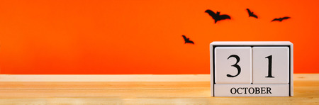 The concept for Halloween. Bats and wooden calendar showing October 31の写真素材