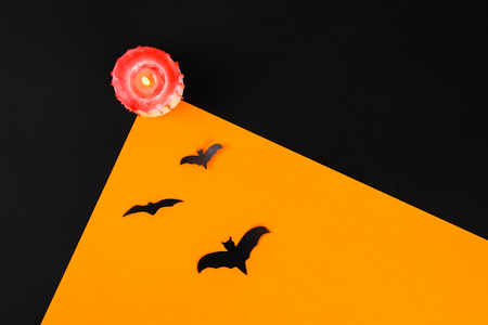 Necessary items for ornament the season. Top view of accessory decoration Happy Halloween festival background concept. Mix variety object on the modern rustic orange wooden at home office deskの写真素材