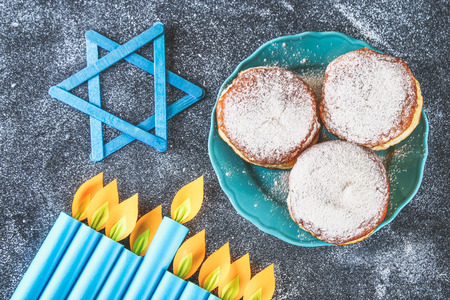 Jewish holiday Hanukkah and its attributes, menorah, donuts, Star of Davidの写真素材