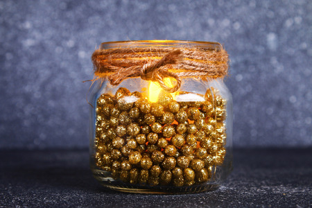 Christmas candle from a jar - how to make a beautiful candlestick with an electric candle made from scrap materials. DIY. Step by step tutorial. Christmas decorの写真素材