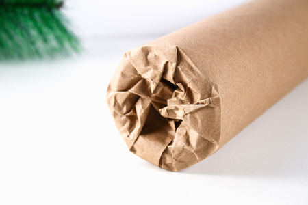 Gift wrap bottles of alcohol for Christmas do it yourself. Packaging bottles of kraft paper, ribbons, beads and Christmas decor. Diy, step by step guide, photo instructionsの写真素材