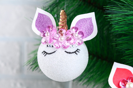 Diy, the unicorn. How to make a unicorn from a Christmas ball toy. Step by step guide photo. Christmas tree decorationsの写真素材