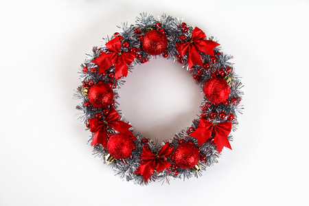 Diy Christmas wreath. Guide on the photo how to make a Christmas wreath with your own hands from a cardboard plate, tinsel, beads, bows and balls. Handmade The decor.の写真素材