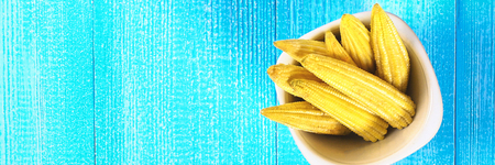 Baby sweetcorn or mini corn. It is typically the eaten whole cob included for the human consumption. It is eaten both raw and cooked. Baby corn is common in stir fry dishesの写真素材