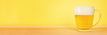 Glass beer on wood background with copy spaceの写真素材