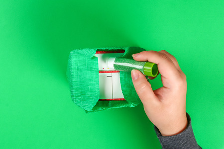 DIY leprechaun trap with gold coins, rainbow and green ladder St Patricks Day background. Gift Idea, decor Saint Patricks Day. Step by step. Child kid craft process. Top view. Irish holiday.の写真素材