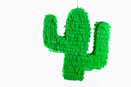 Diy cinco de mayo Mexican Pinata Cactus made cardboard and crepe paper your own hands on a blue background. Gift idea, decor, game cinco de mayo. Step by step. Top view. Process kid children craft.の写真素材