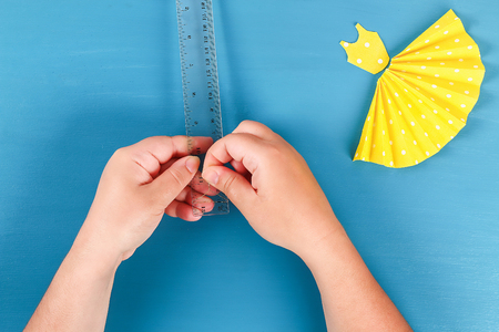 9 Diy Mothers Day greeting card with a paper napkin dress and flower decorationの写真素材
