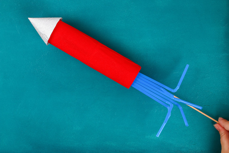 Diy 4th July petard toilet sleeve, paper, cardboard color American flag red blue white. Gift idea decor July 4, USA Independence Day. Step by step. Top view Process kid children craft. Workshopの写真素材