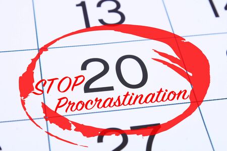 Procrastination, delay and urgency concept. Calendar with the date marked with a red marker stop...