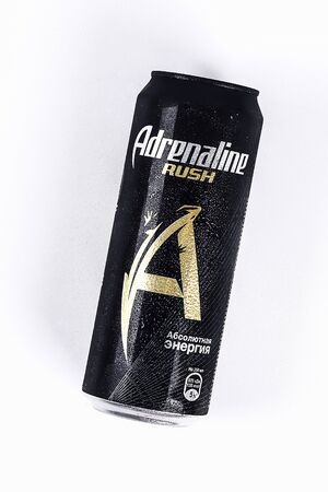 Aluminum black tin can power adrenalin rush on a white background. Stavropol, June 2019.