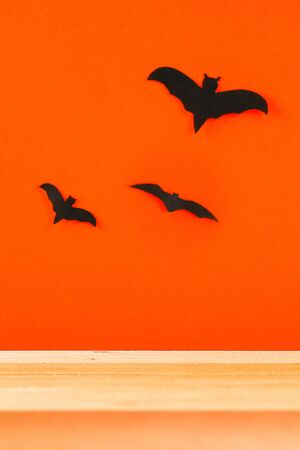 The concept for Halloween. Bats on an orange background.の写真素材