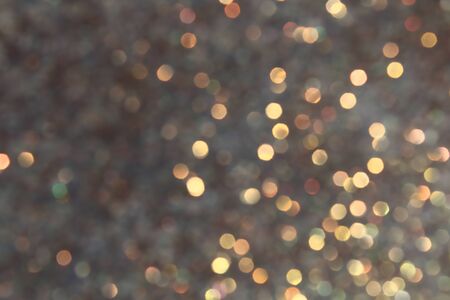 Blurred Bokeh. Holiday glowing backdrop. Christmas light background. Defocused Background With Blinking Stars.の写真素材