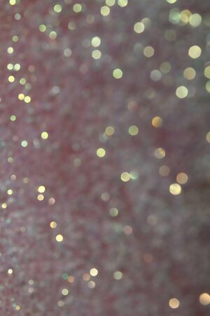 Blurred Bokeh. Holiday glowing backdrop. Christmas light background. Defocused Background With Blinking Stars.の写真素材