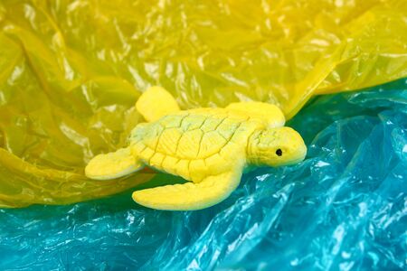 Plastic pollution in ocean environmental problem. Sea Turtle eat plastic bag. Ecological situation...