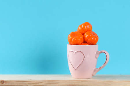 Halloween holiday concept with pumpkin decor on wooden table. Sale time.の写真素材